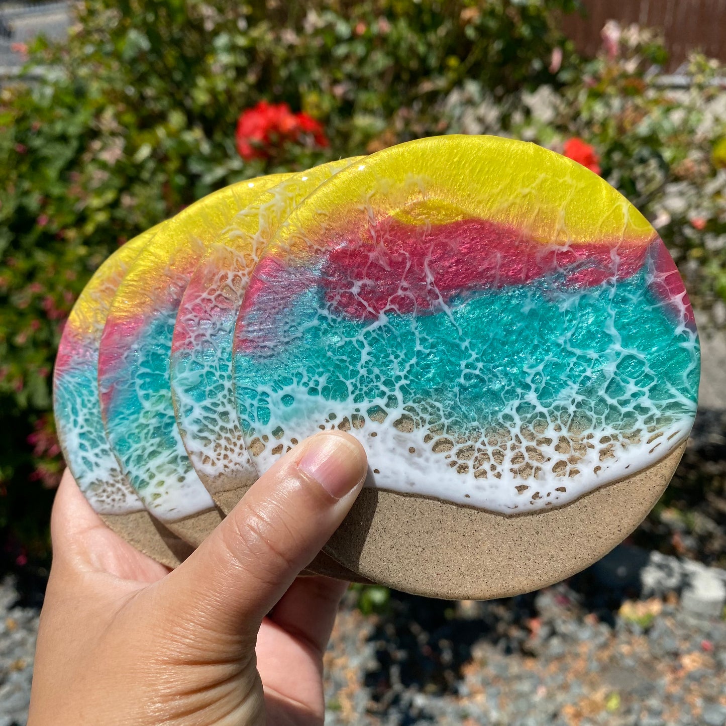 Set of 4 Teal, Peach and Yellow Round Wooden Coasters.